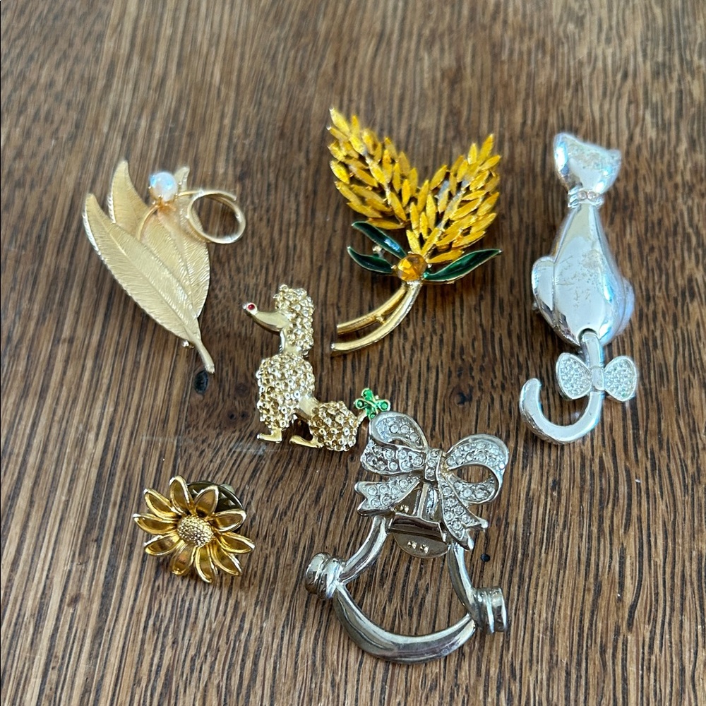 Gold and Silver Brooch Set